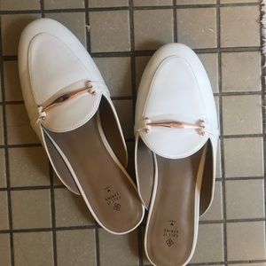 White loafer mules from Call It Spring.